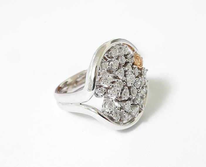 ANELLO DAMIANI BAGLIORI IN ORO BIANCO E ORO ROSA CON DIAMANTI ( ct. 1,06 )