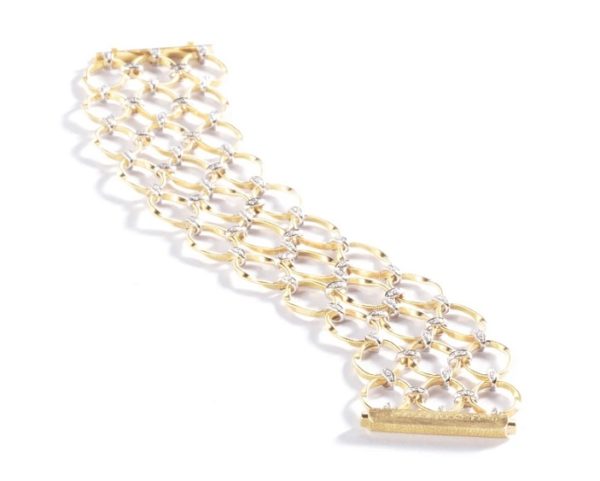 BRACCIALE MARCO BICEGO MARRAKECH ONDE IN ORO GIALLO E BIANCO CON DIAMANTI (ct.0,83)