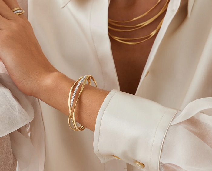 BRACCIALE MARCO BICEGO MARRAKECH A TRE FILI IN ORO GIALLO E BIANCO CON DIAMANTI (ct. 0,19) - immagine 2