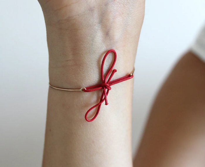 BRACCIALE RUBINIA FILODAMORE IN ORO GIALLO 9KT CHIUSURA CON CORDONE - immagine 2